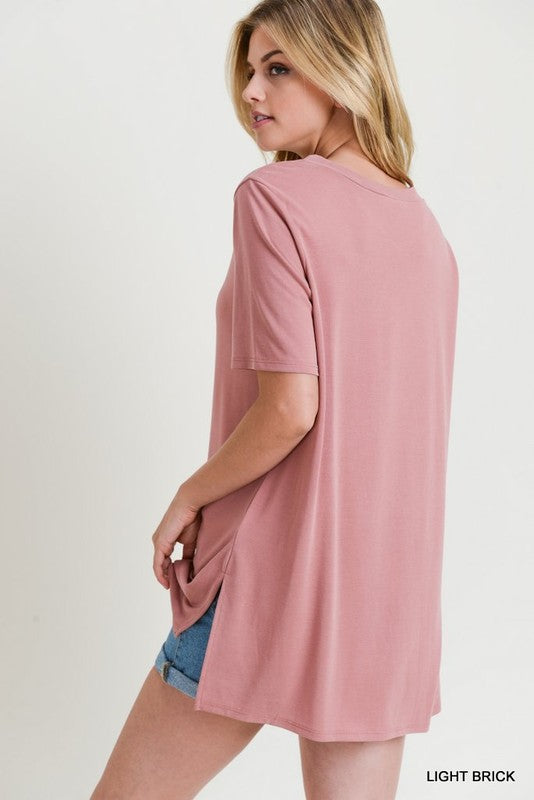 Solid top with short sleeves and neck cut out